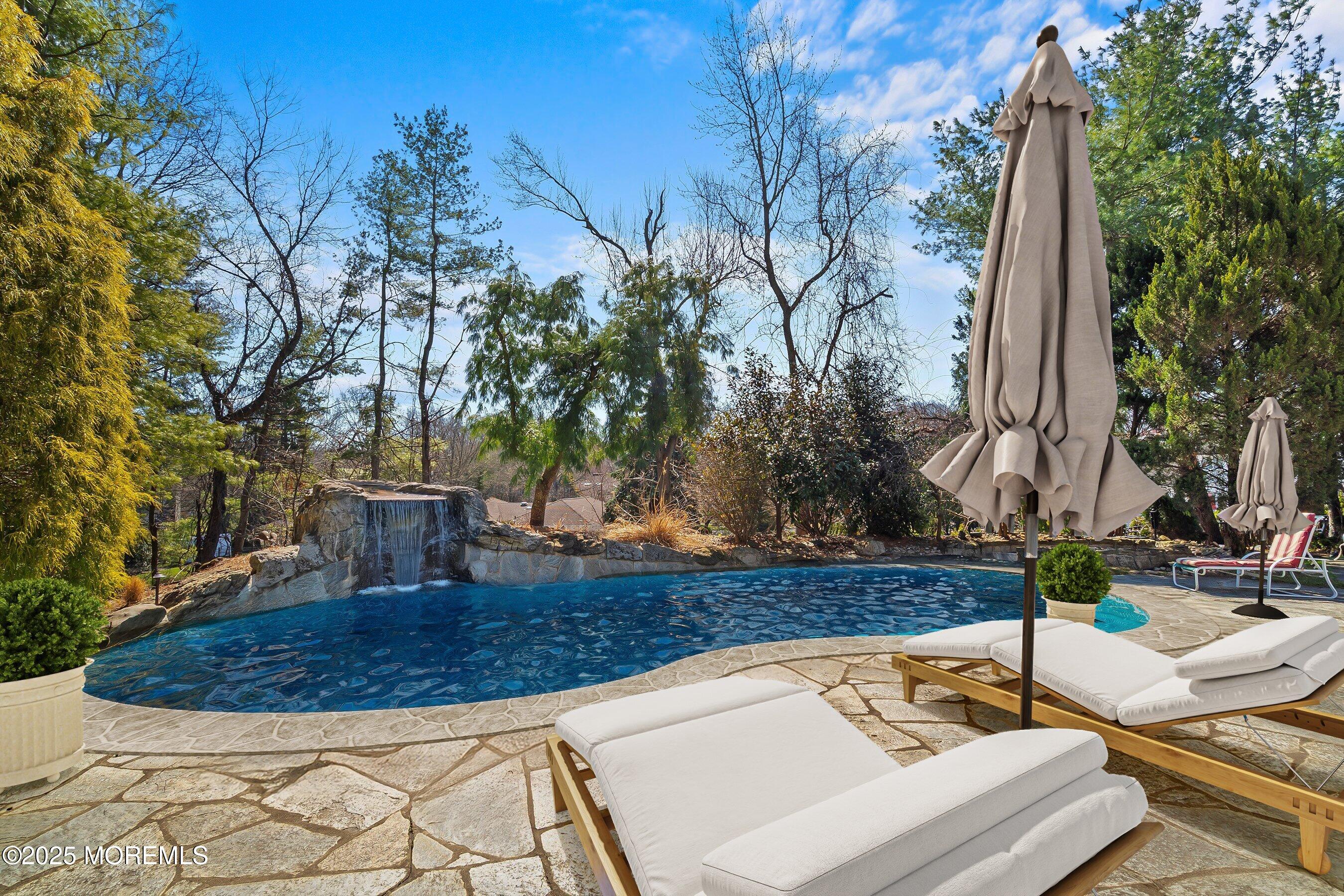 4 Colts Drive Holmdel, NJ 07733 - Photo 17 of 44 Pool Deck 3 - virtually opened and stage