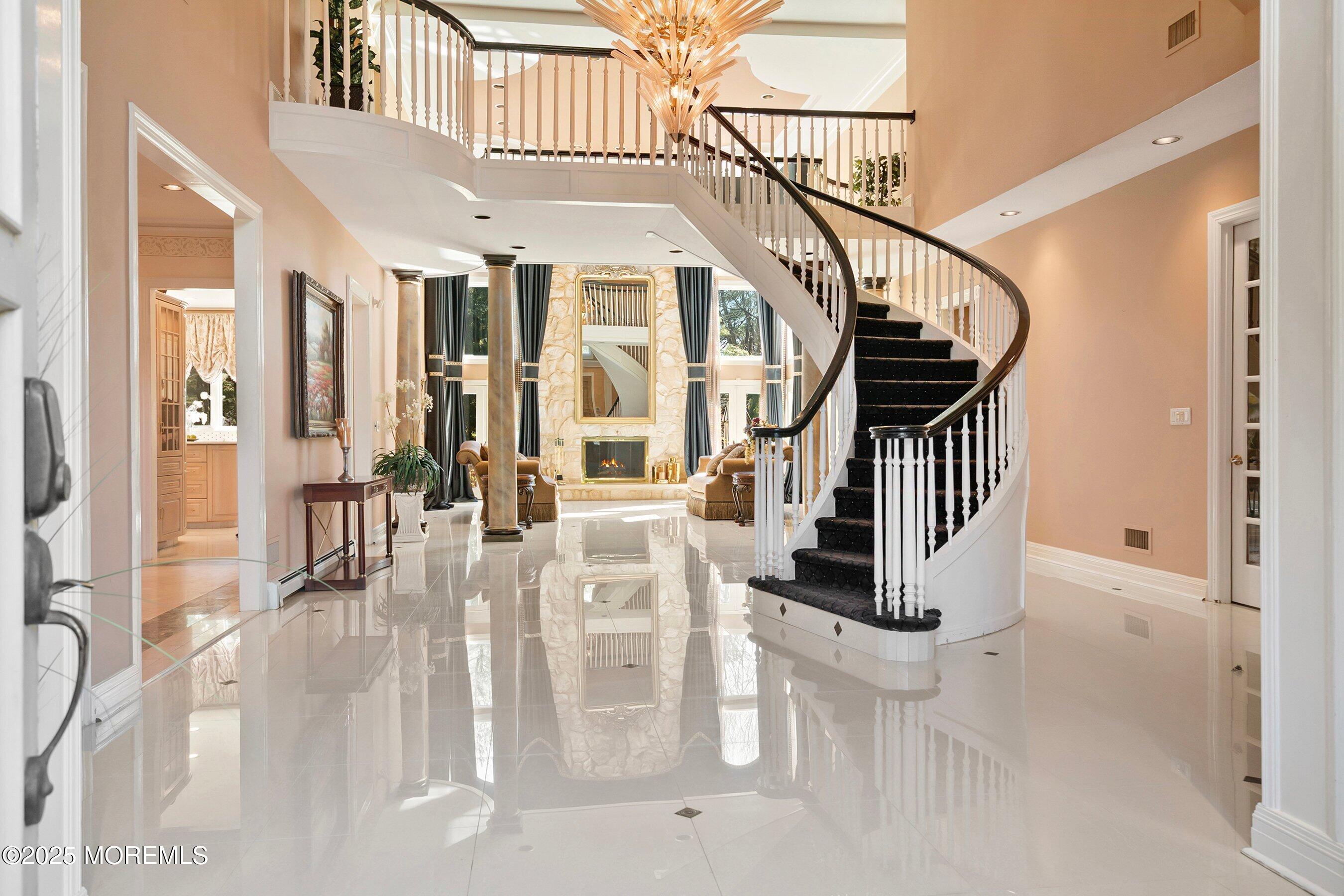 4 Colts Drive Holmdel, NJ 07733 - Photo 7 of 44 Foyer 1B with fire