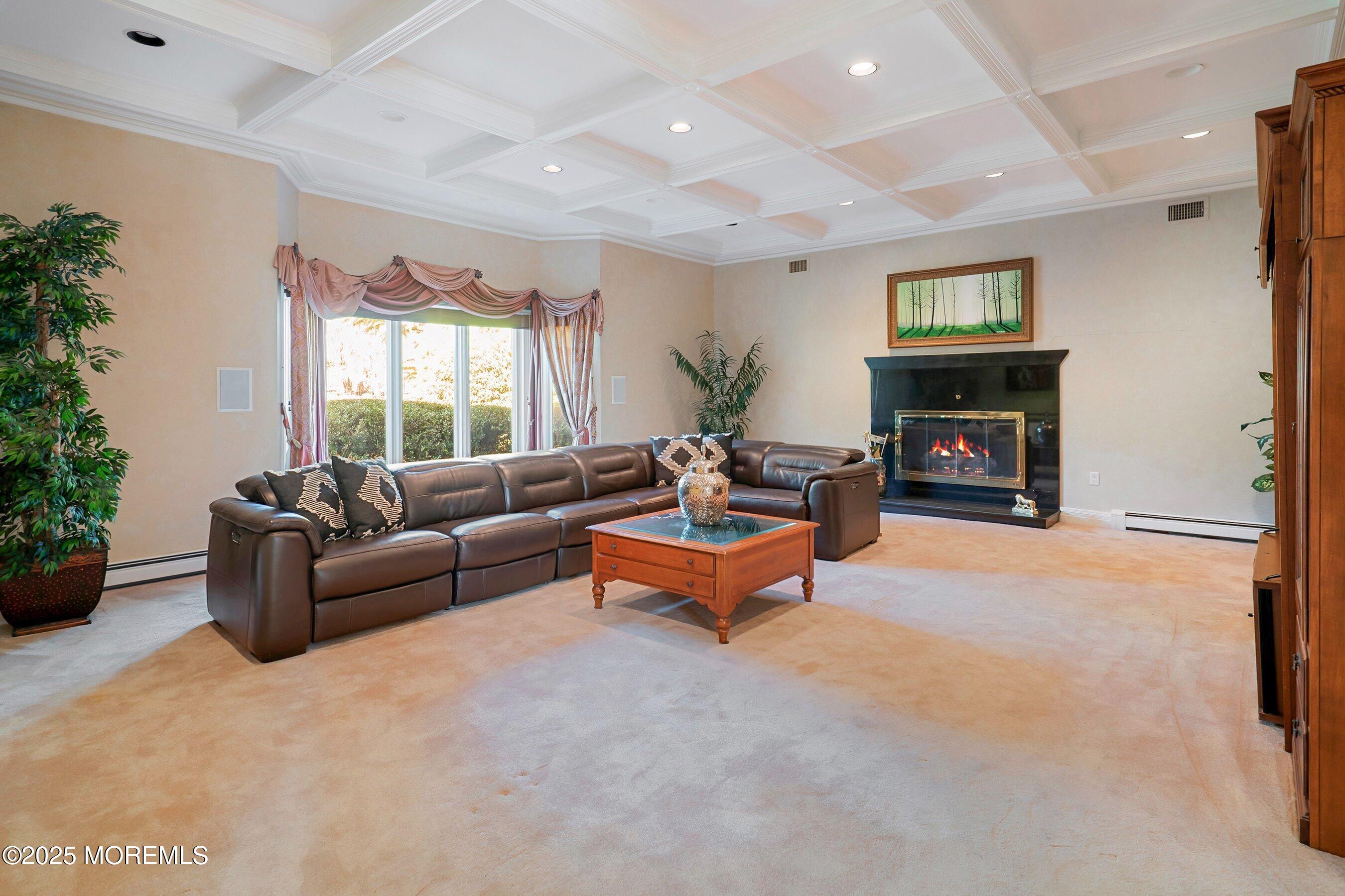 4 Colts Drive Holmdel, NJ 07733 - Photo 10 of 44 Parlor 1 with fire ADJUSTED