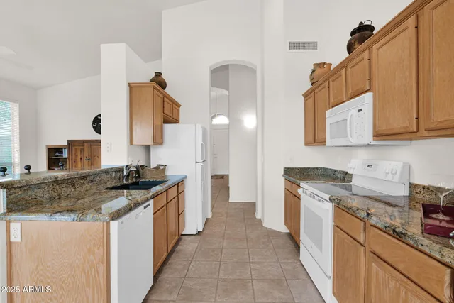 a bathroom with a shower and a toilet