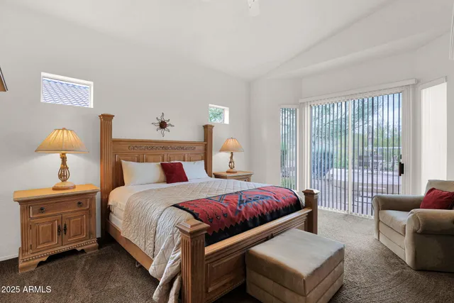 a dining room with a table and chairs