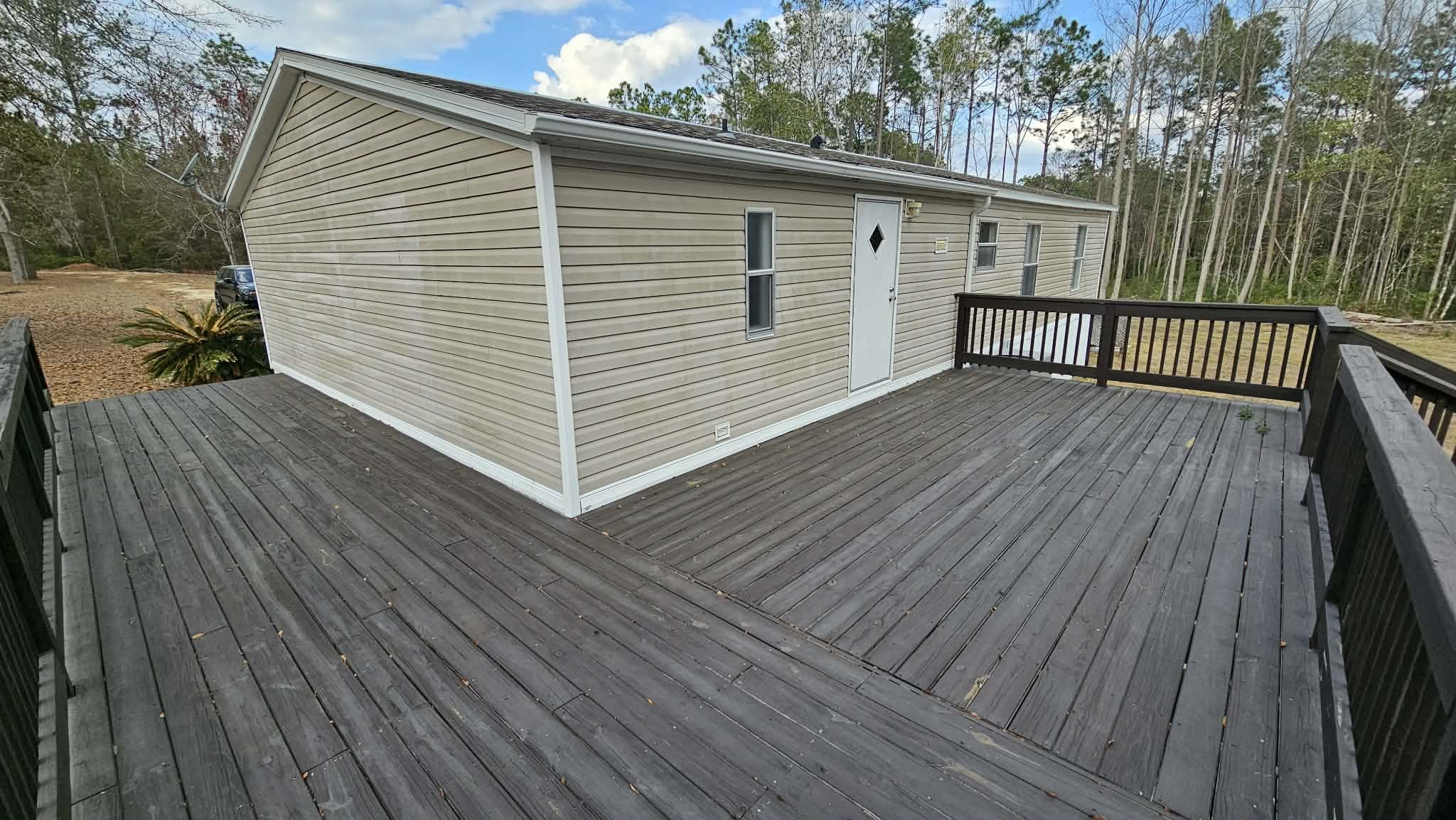 28183 Ramble Lane Hilliard, FL 32046 - Photo 28 of 34 a view of a wooden deck