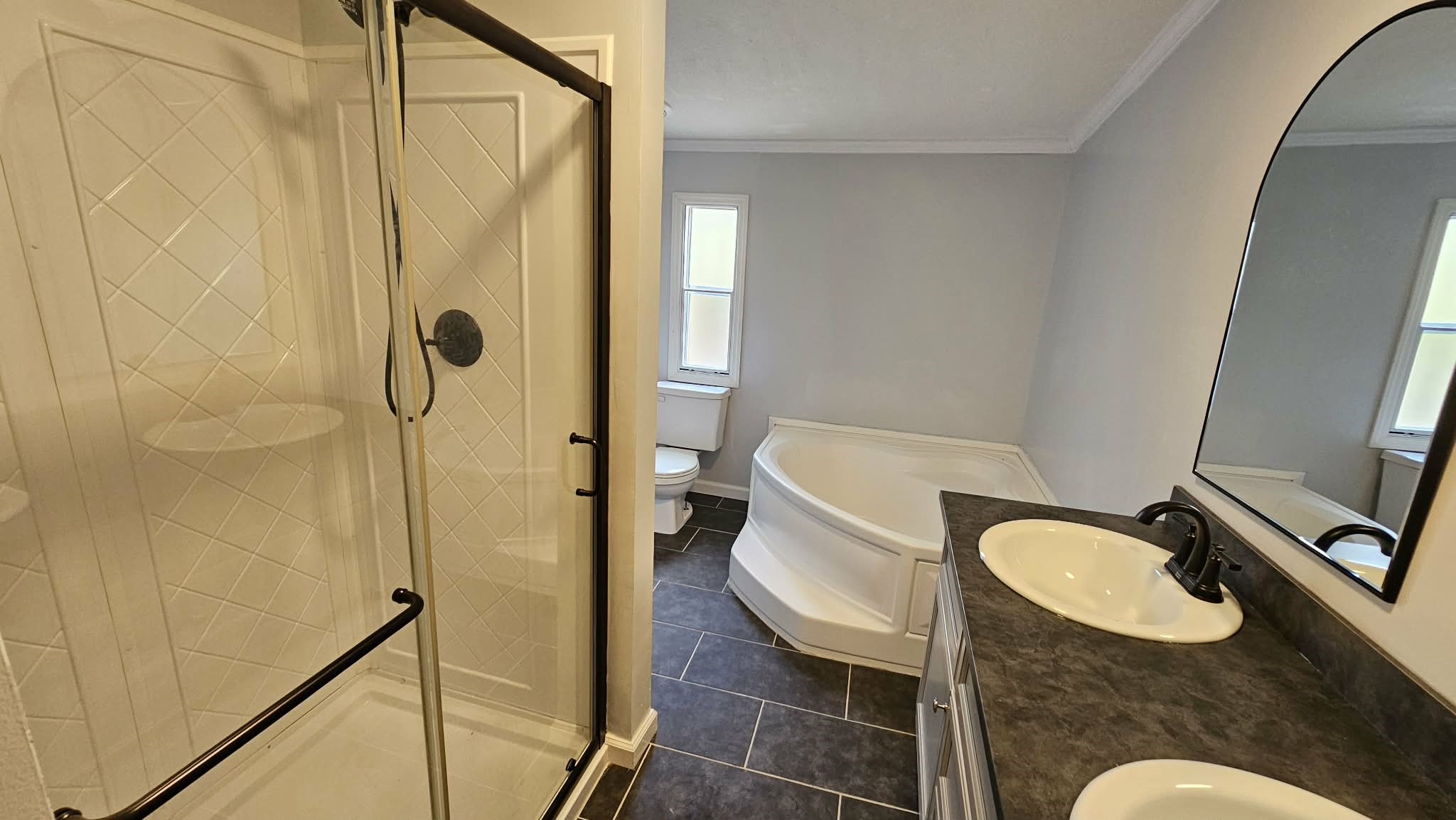 28183 Ramble Lane Hilliard, FL 32046 - Photo 9 of 34 a bathroom with a sink toilet and shower