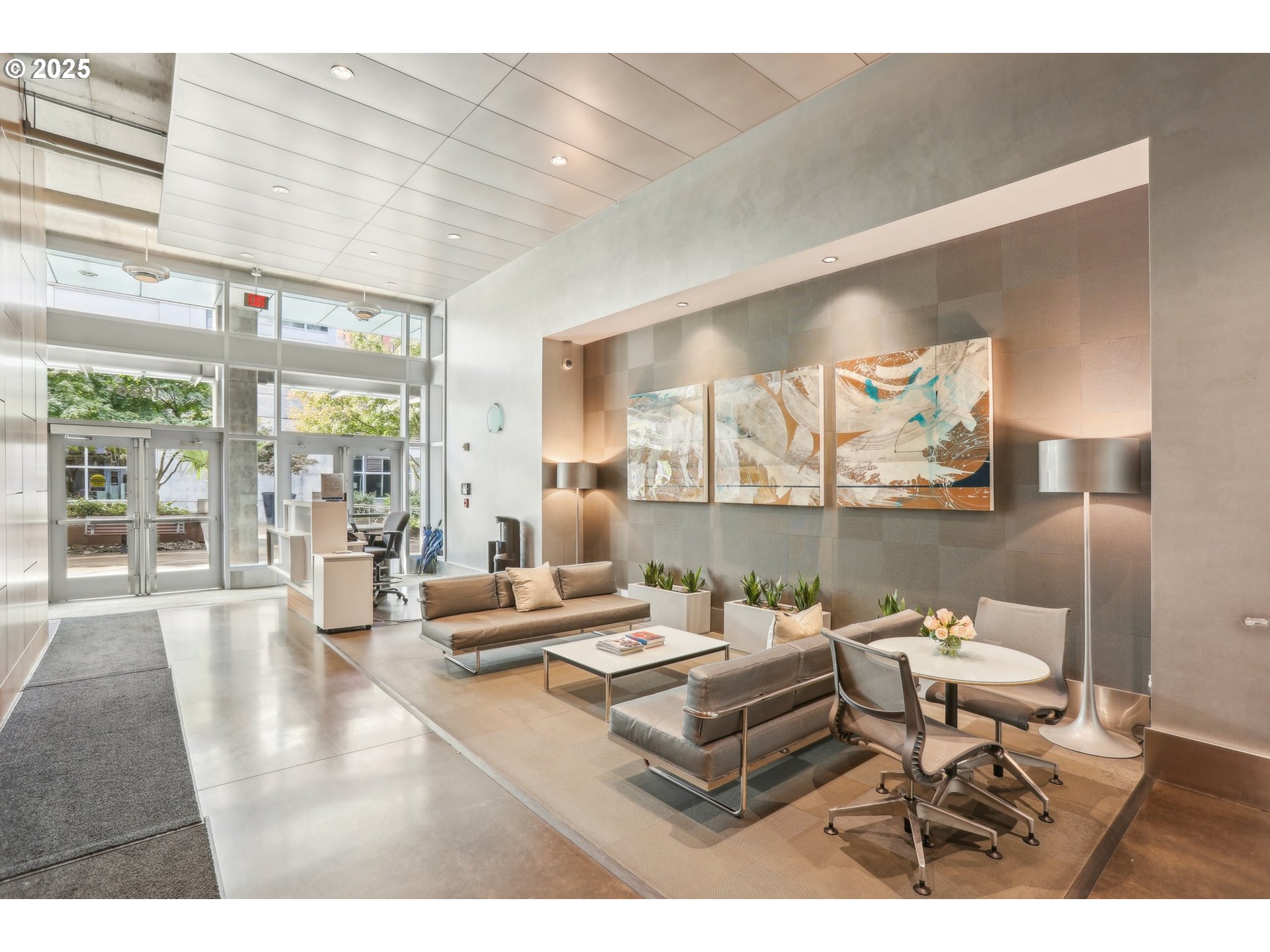 1926 West Burnside Street, Unit 912 Portland, OR 97209 - Photo 3 of 19 a living room with furniture and a large window