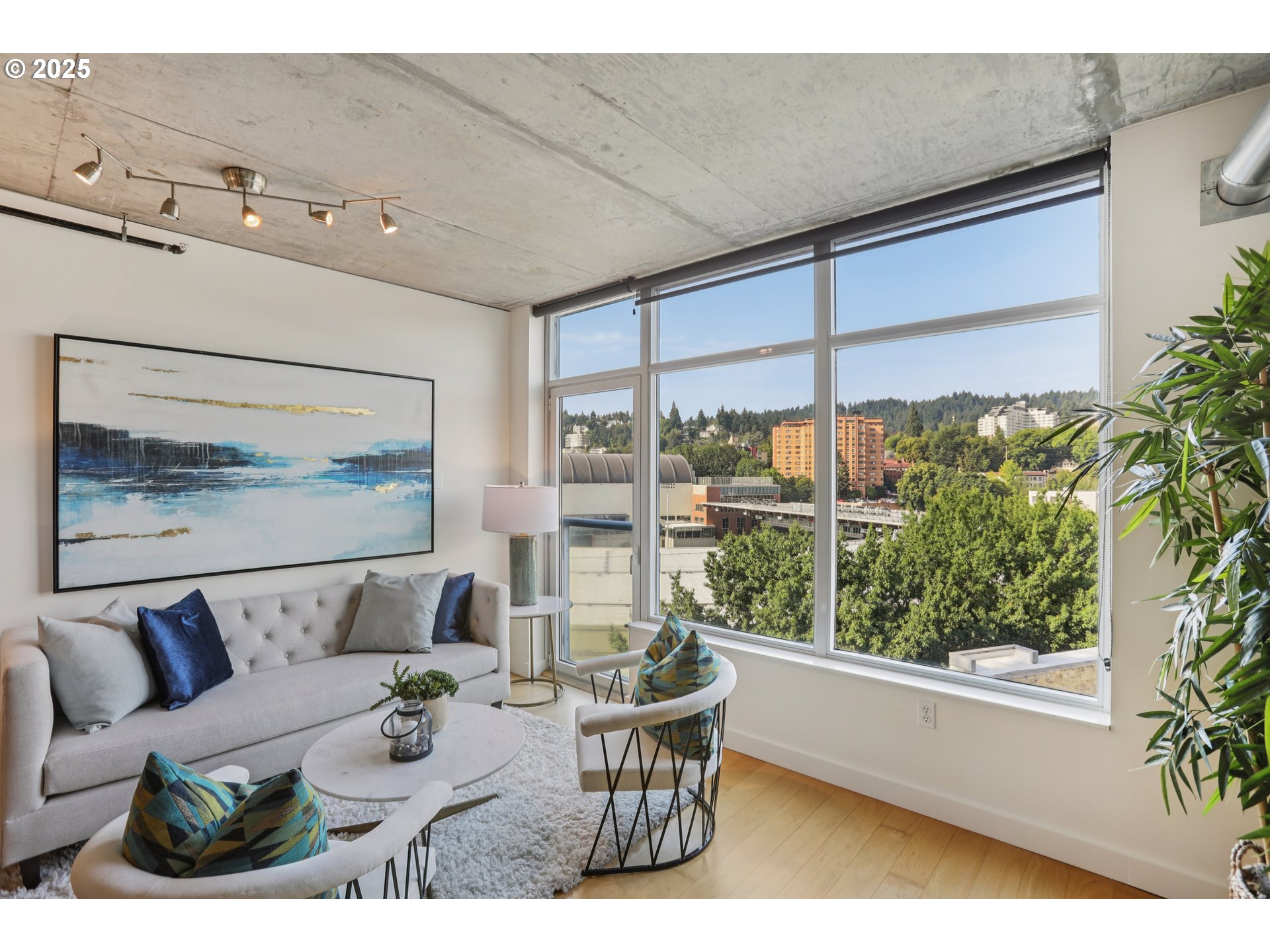 1926 West Burnside Street, Unit 912 Portland, OR 97209 - Photo 4 of 19 a view of a living room and a window