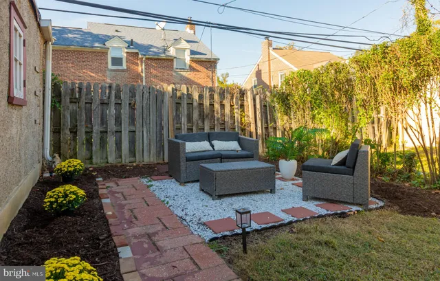 a garden view with a seating space