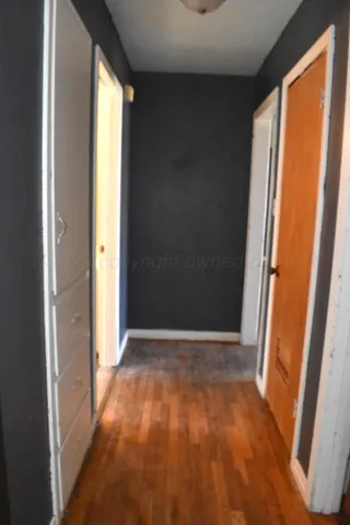 a view of hallway with windows