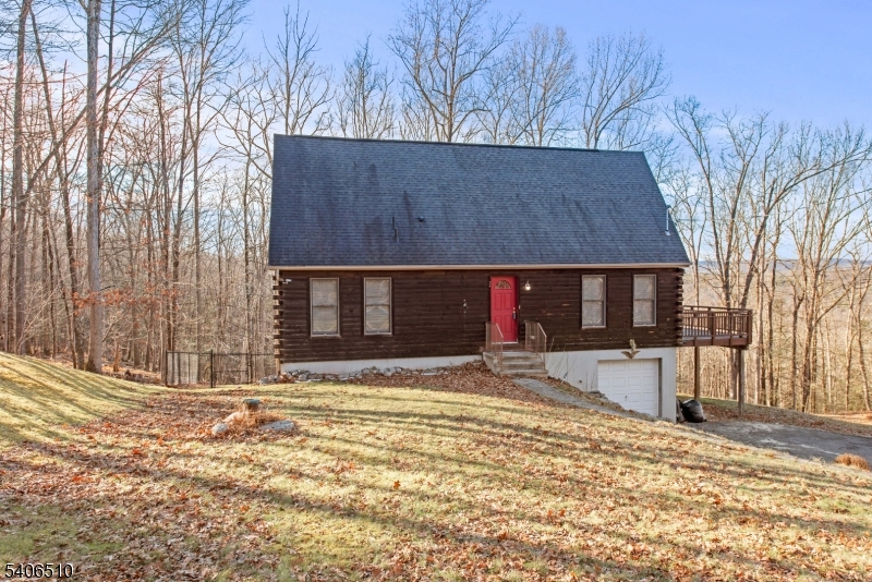 a house with trees in the background