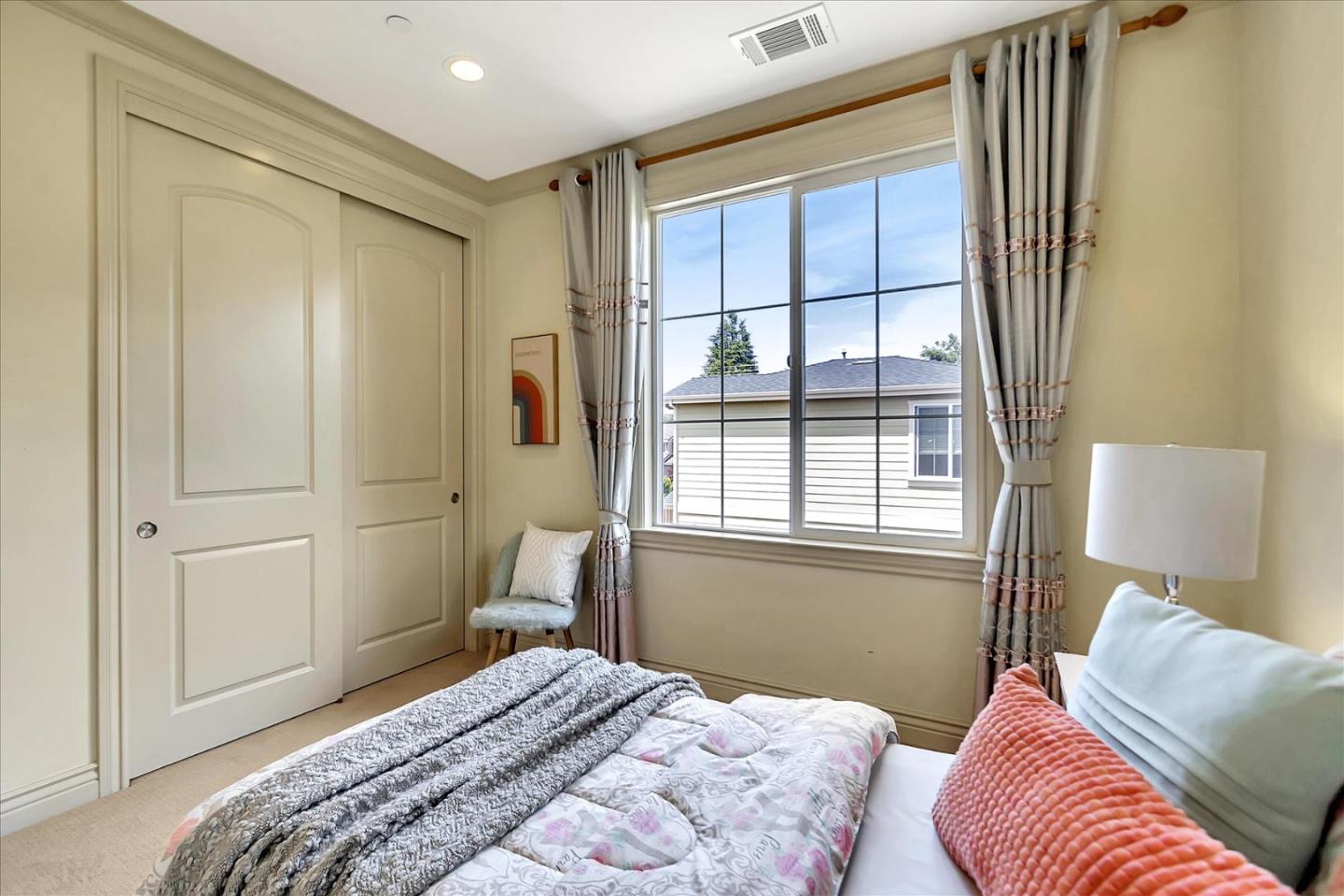 184 Redding Road Campbell, CA 95008 - Photo 17 of 34 a bedroom with a bed and a window