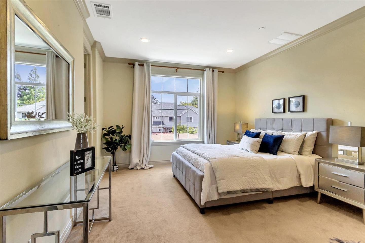 184 Redding Road Campbell, CA 95008 - Photo 22 of 34 a bedroom with a bed and a table in it