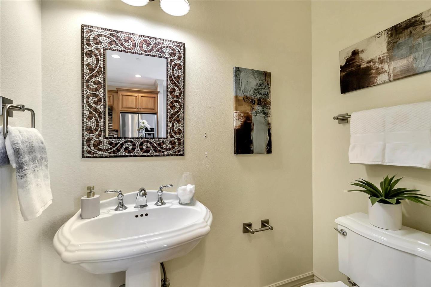 184 Redding Road Campbell, CA 95008 - Photo 27 of 34 a bathroom with a toilet sink and mirror