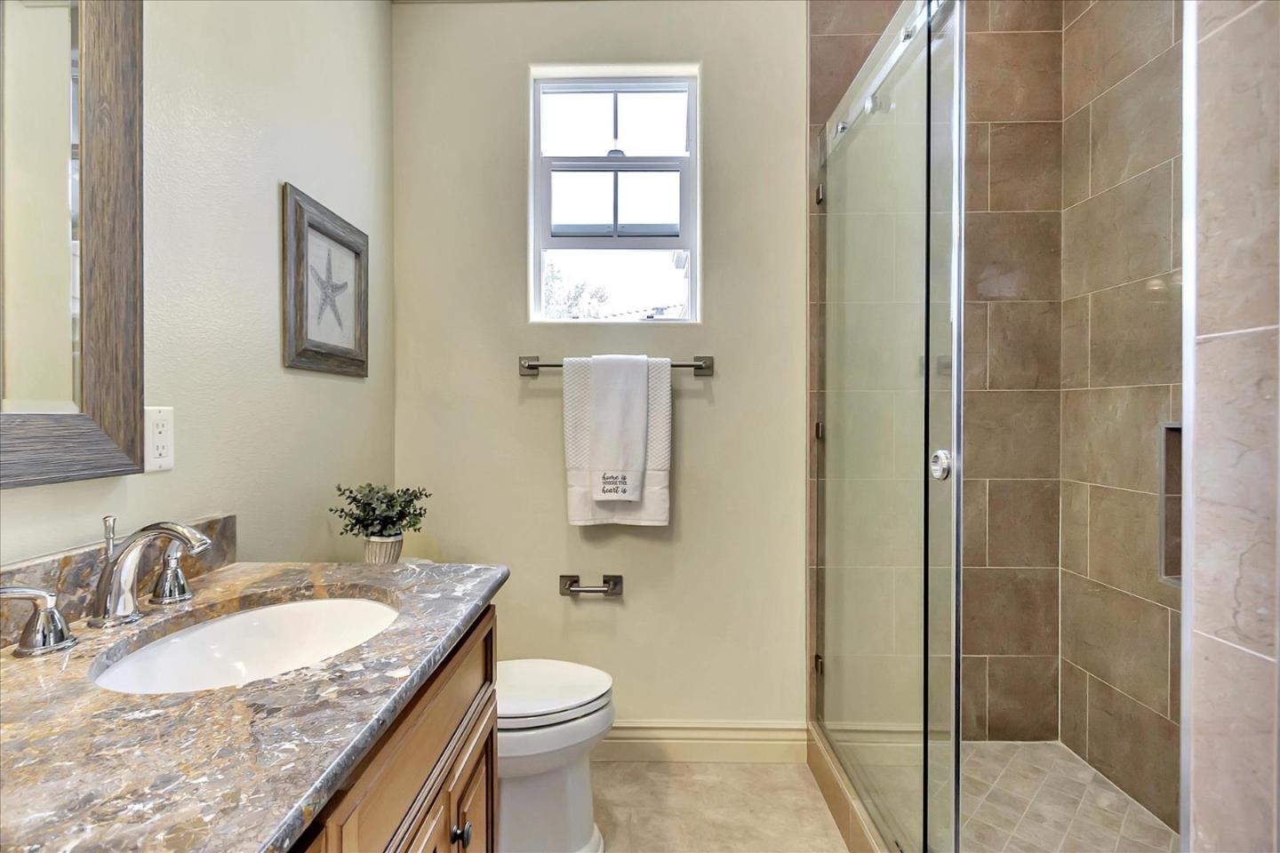184 Redding Road Campbell, CA 95008 - Photo 29 of 34 a bathroom with a granite countertop sink a toilet and shower