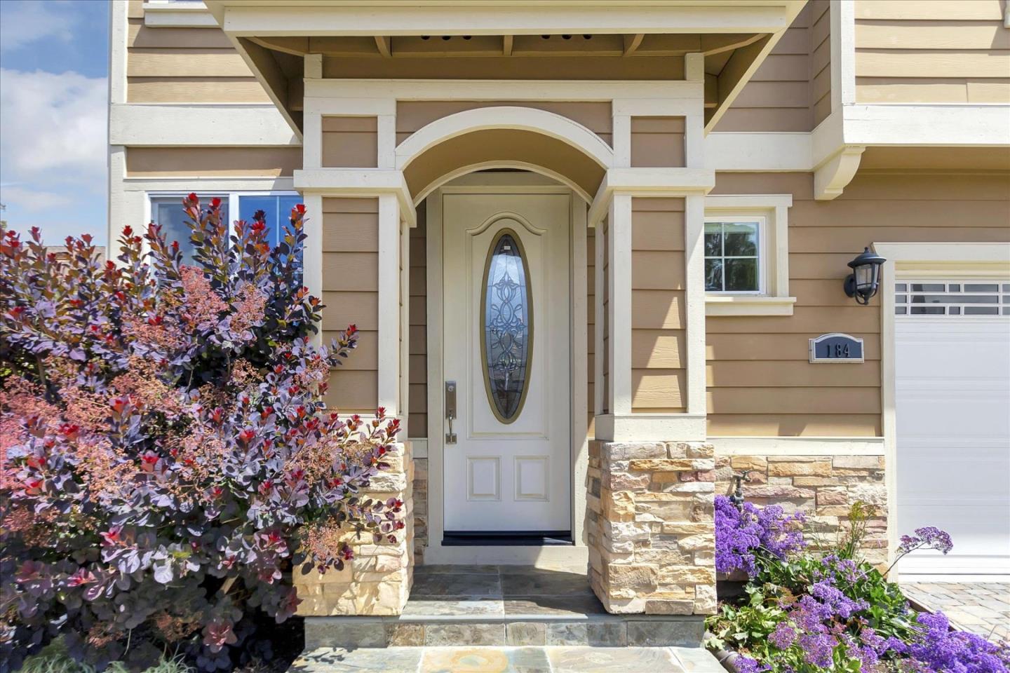 184 Redding Road Campbell, CA 95008 - Photo 3 of 34 a front view of a house with a garden