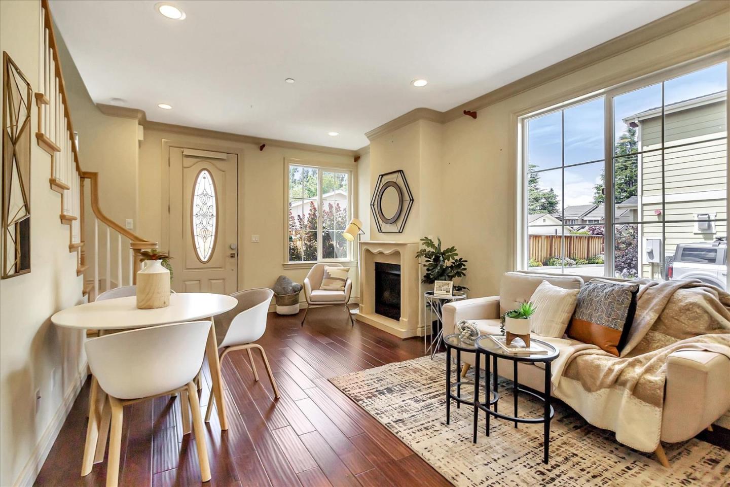 184 Redding Road Campbell, CA 95008 - Photo 4 of 34 a living room with fireplace furniture and a large window