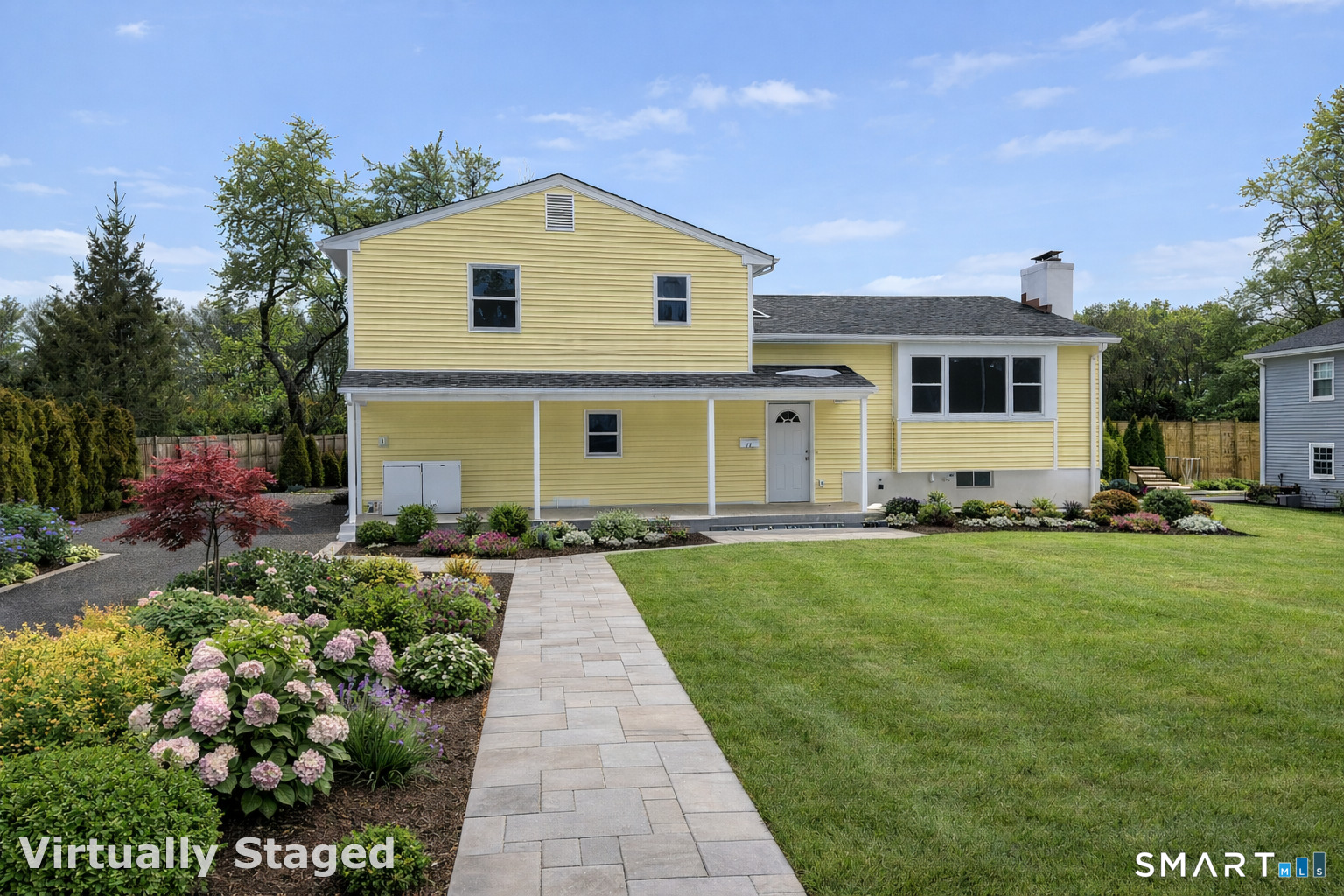 15 Dairy Farm Road Norwalk, CT 06851 - Photo 6 of 9 a front view of a house with a yard