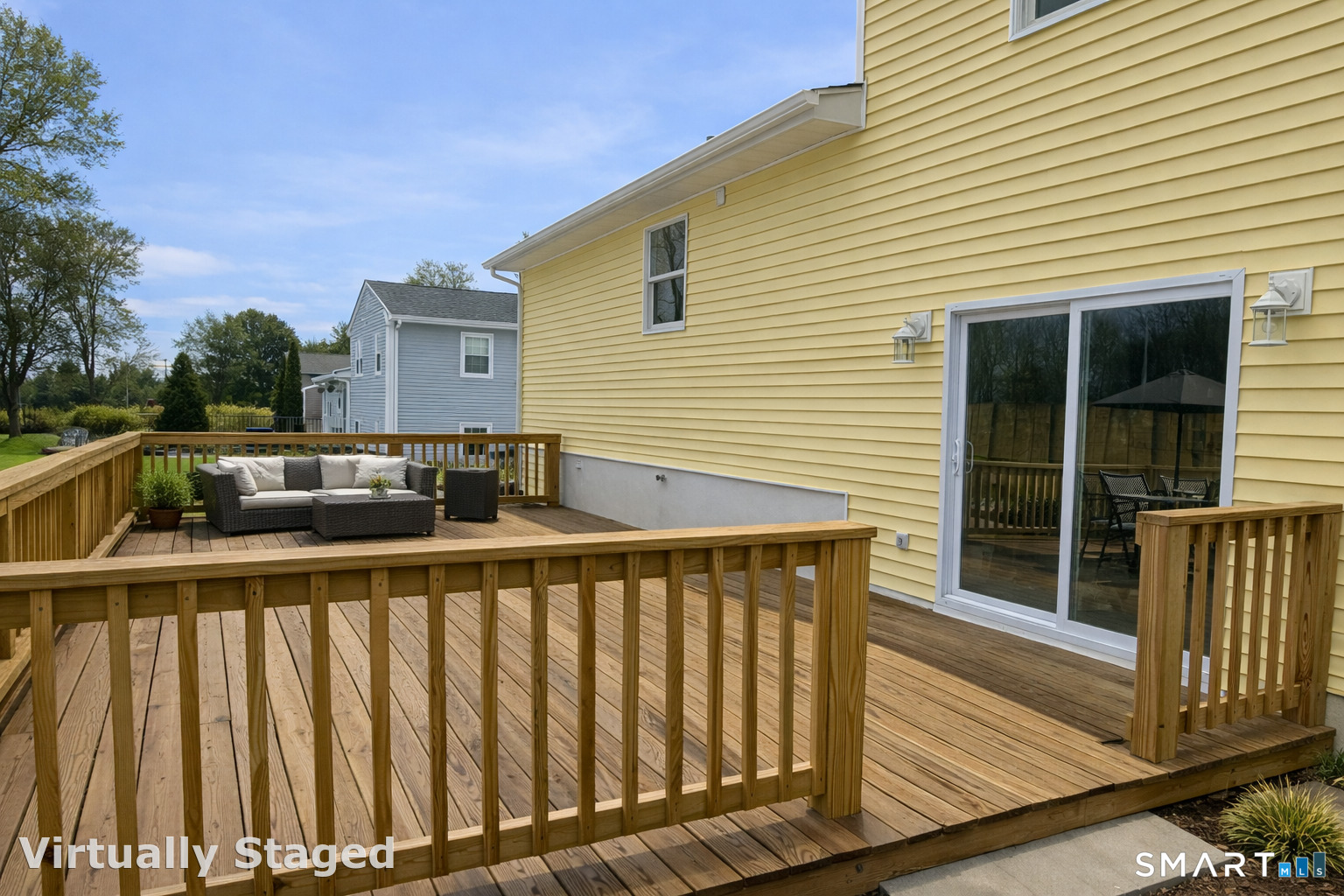 15 Dairy Farm Road Norwalk, CT 06851 - Photo 7 of 9 a view of a house with a wooden fence