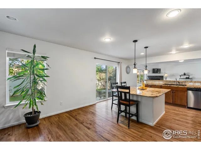 a view of a kitchen and dining room