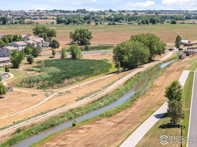 a view of a lake from a city