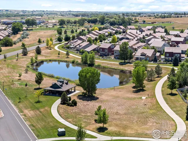 an aerial view of a house with outdoor space
