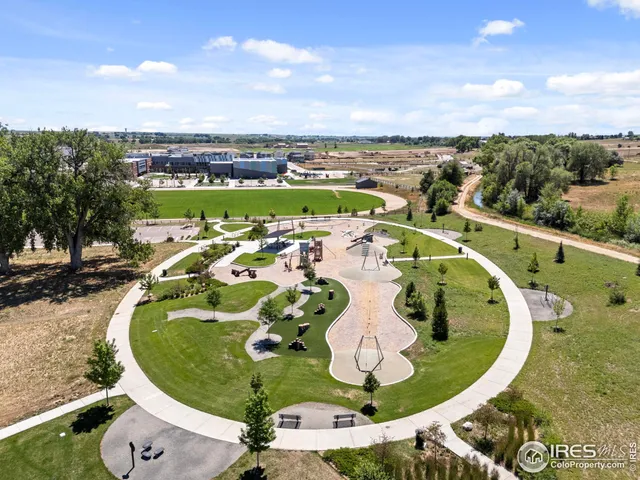a view of a swimming pool with a lounge chair