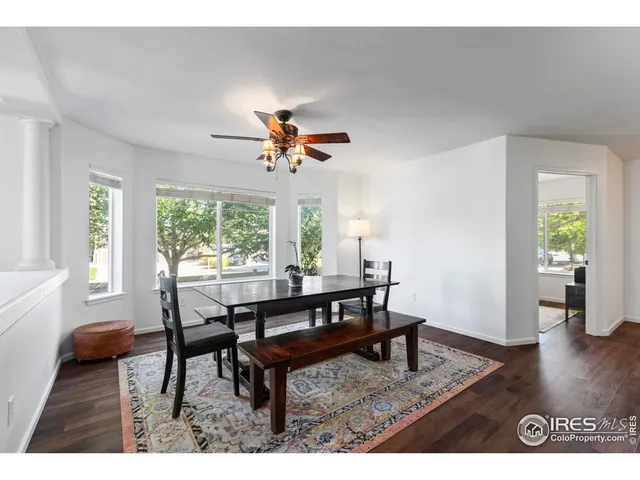 a view of a livingroom with furniture and wooden floor