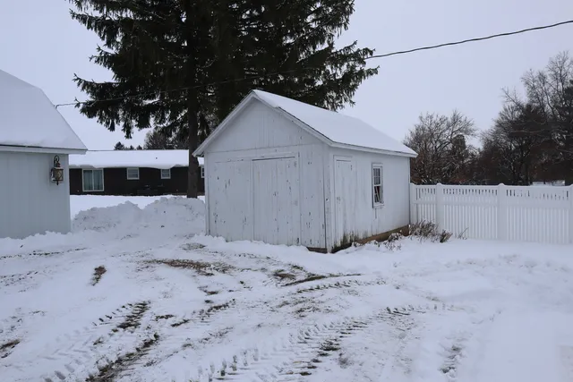 a view of a covered with snow in the background