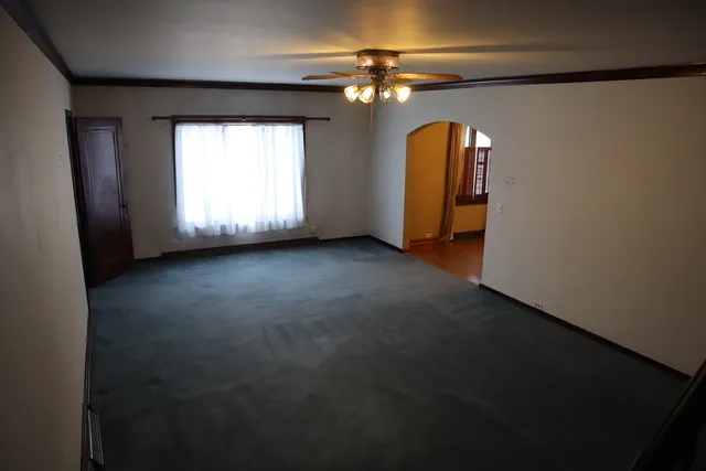 a view of a room with a large window