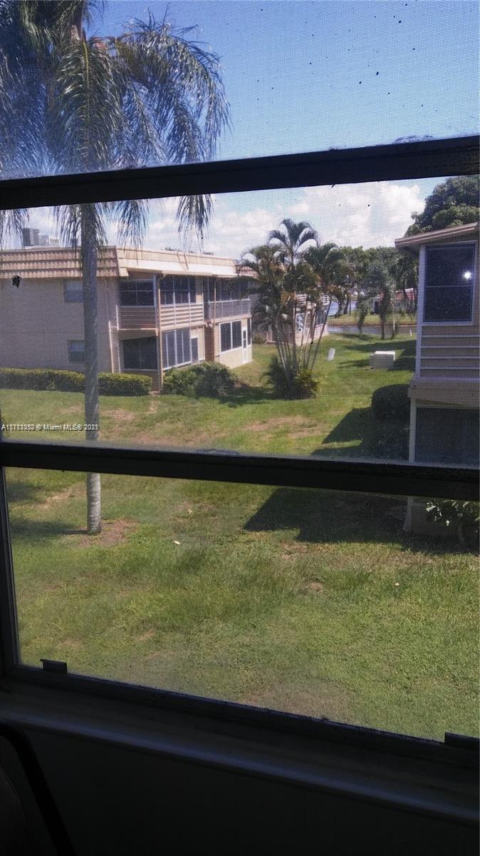134 Monaco Court, Unit 134 Delray Beach, FL 33446 - Photo 8 of 10 a view of swimming pool from a balcony
