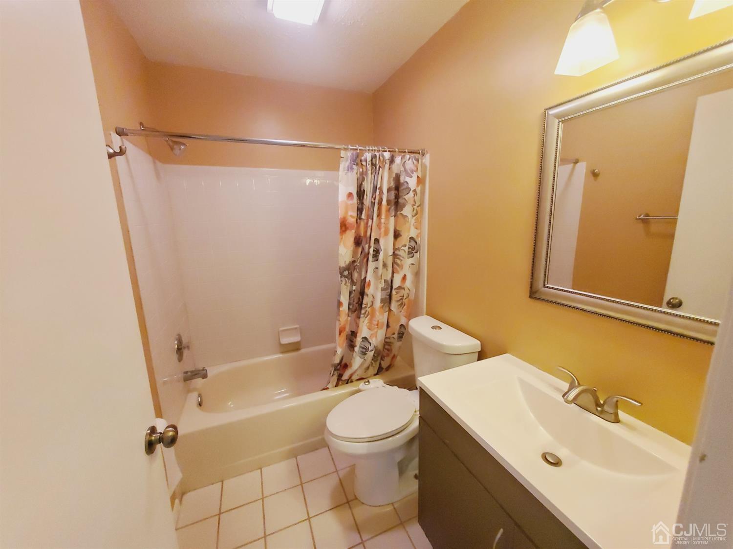 148 Nebula Road Piscataway, NJ 08854 - Photo 17 of 22 a bathroom with a sink a toilet and shower