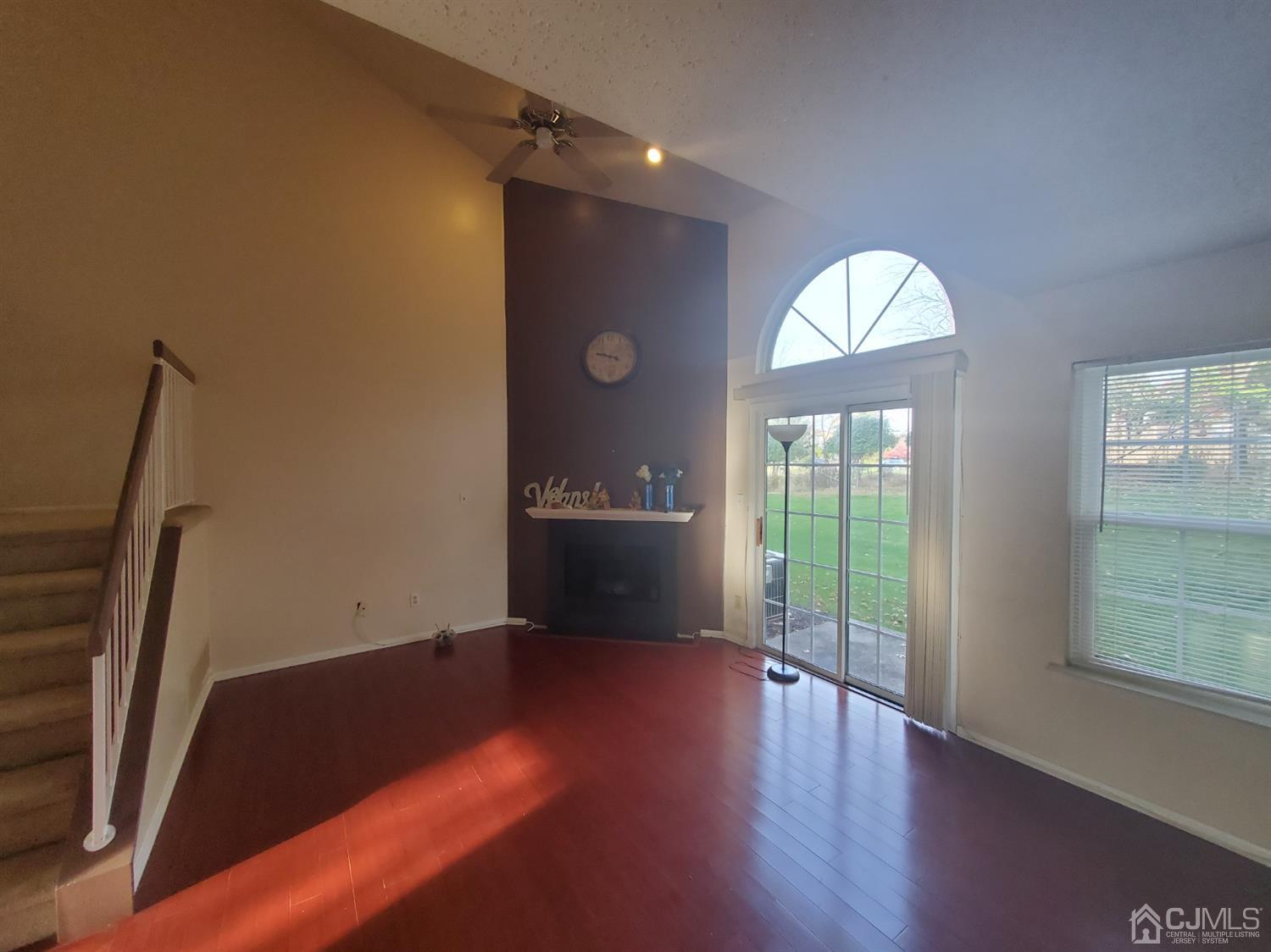 148 Nebula Road Piscataway, NJ 08854 - Photo 7 of 22 a view of empty room with wooden floor and fan
