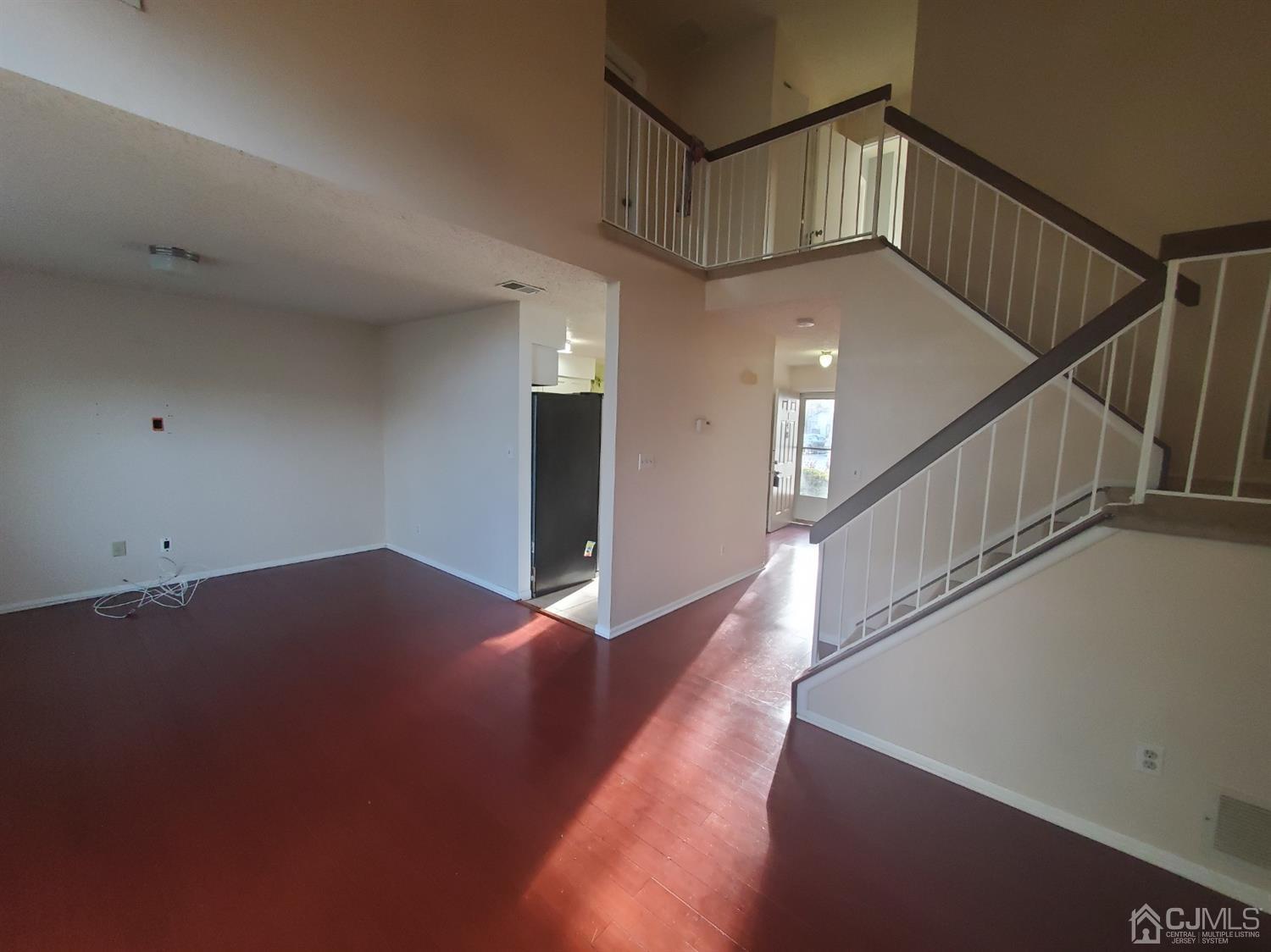 148 Nebula Road Piscataway, NJ 08854 - Photo 9 of 22 a view of a hallway with staircase
