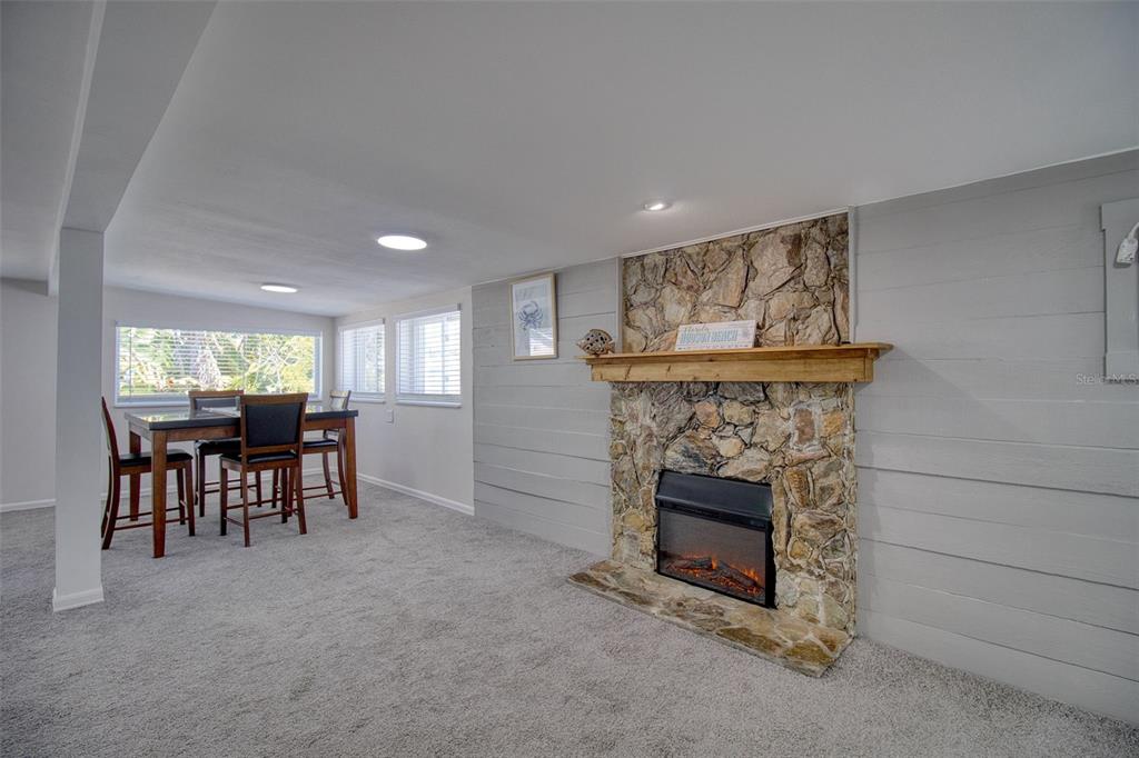 6820 Sea Ranch Drive Hudson, FL 34667 - Photo 6 of 29 a view of a livingroom with furniture and a fireplace