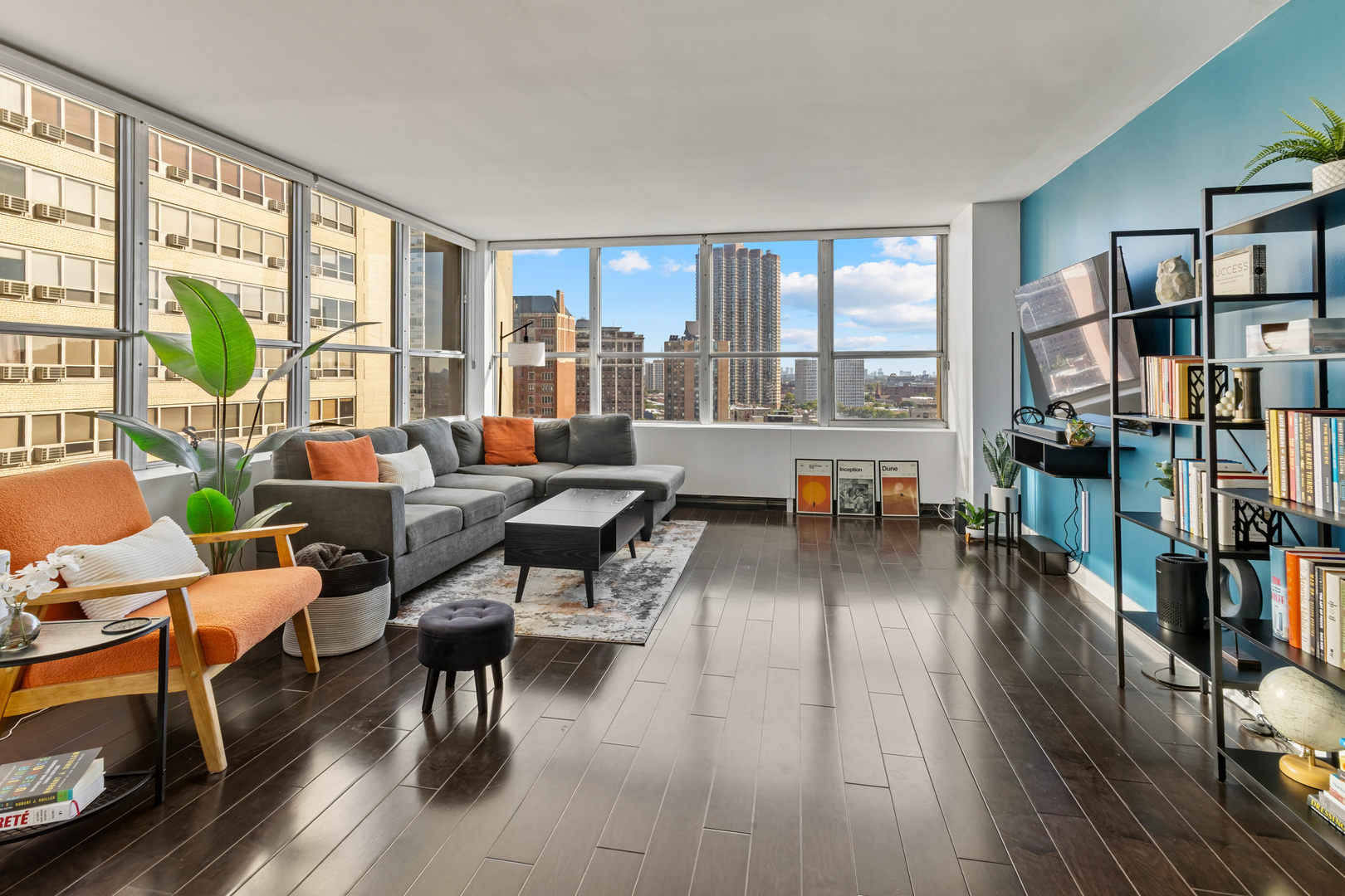 655 West Irving Park Road, Unit 1301 Chicago, IL 60613 - Photo 2 of 22 a living room with furniture and a large window