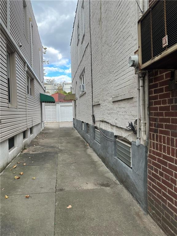 981 78th Street Brooklyn, NY 11228 - Photo 2 of 9 a view of a pathway along the building