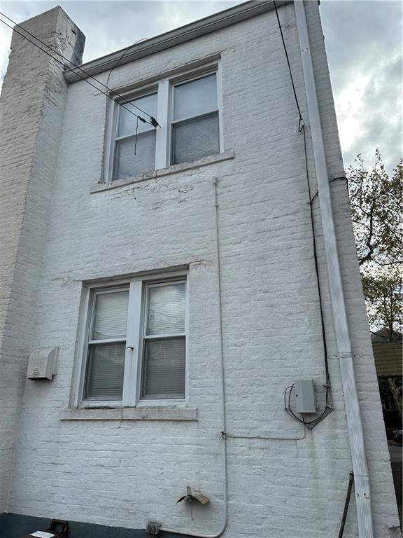 981 78th Street Brooklyn, NY 11228 - Photo 4 of 9 a front view of a house