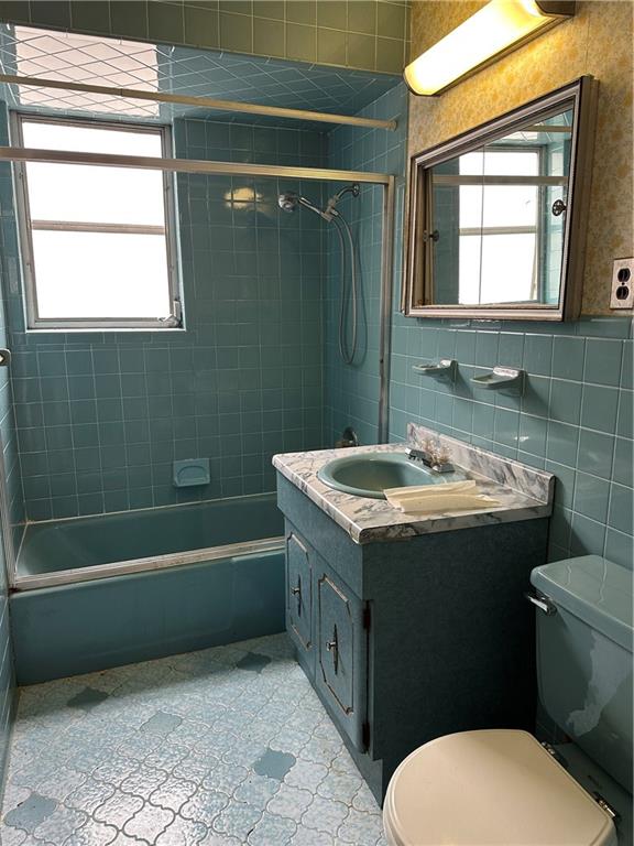981 78th Street Brooklyn, NY 11228 - Photo 9 of 9 a bathroom with a sink toilet and shower