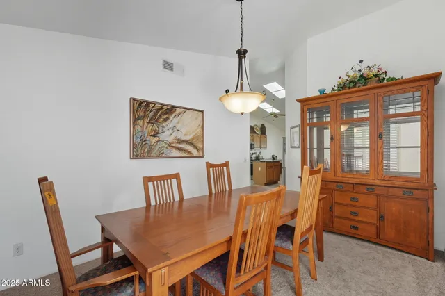 a spacious bedroom with a bed and window