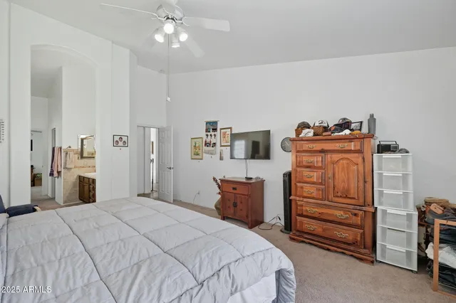a bathroom with a sink double vanity granite and a mirror