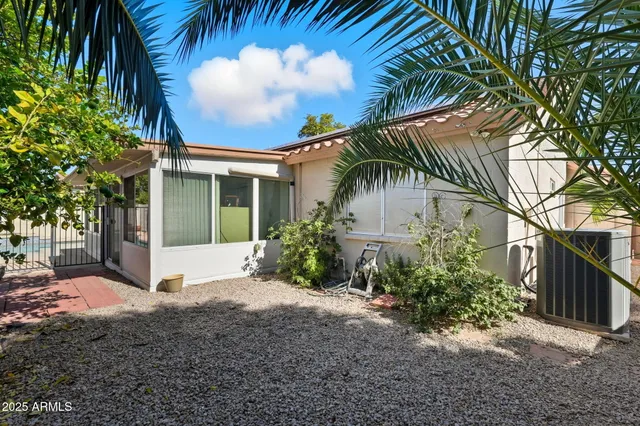 a view of a back yard of the house