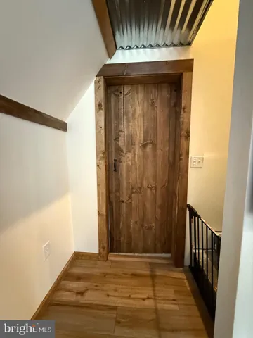 a bathroom with a sink and mirror