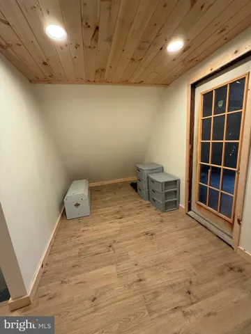 a view of a yard with a house in the background