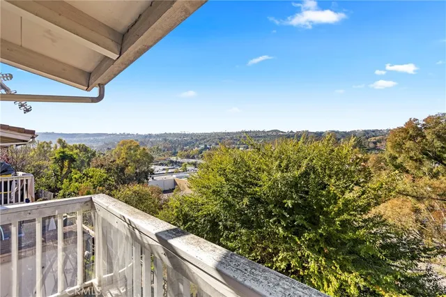 a view of a balcony with an outdoor space