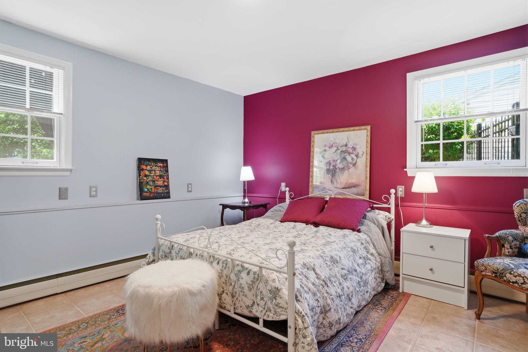 621 River Road Yardley, PA 19067 - Photo 40 of 75 a bedroom with a bed and wooden floor