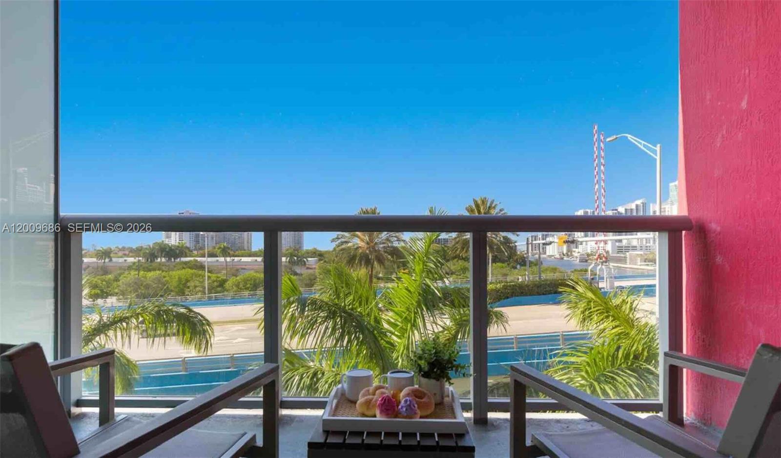 2602 East Hallandale Beach Boulevard, Unit R506 Hallandale Beach, FL 33009 - Photo 1 of 10 a view of a city from a balcony