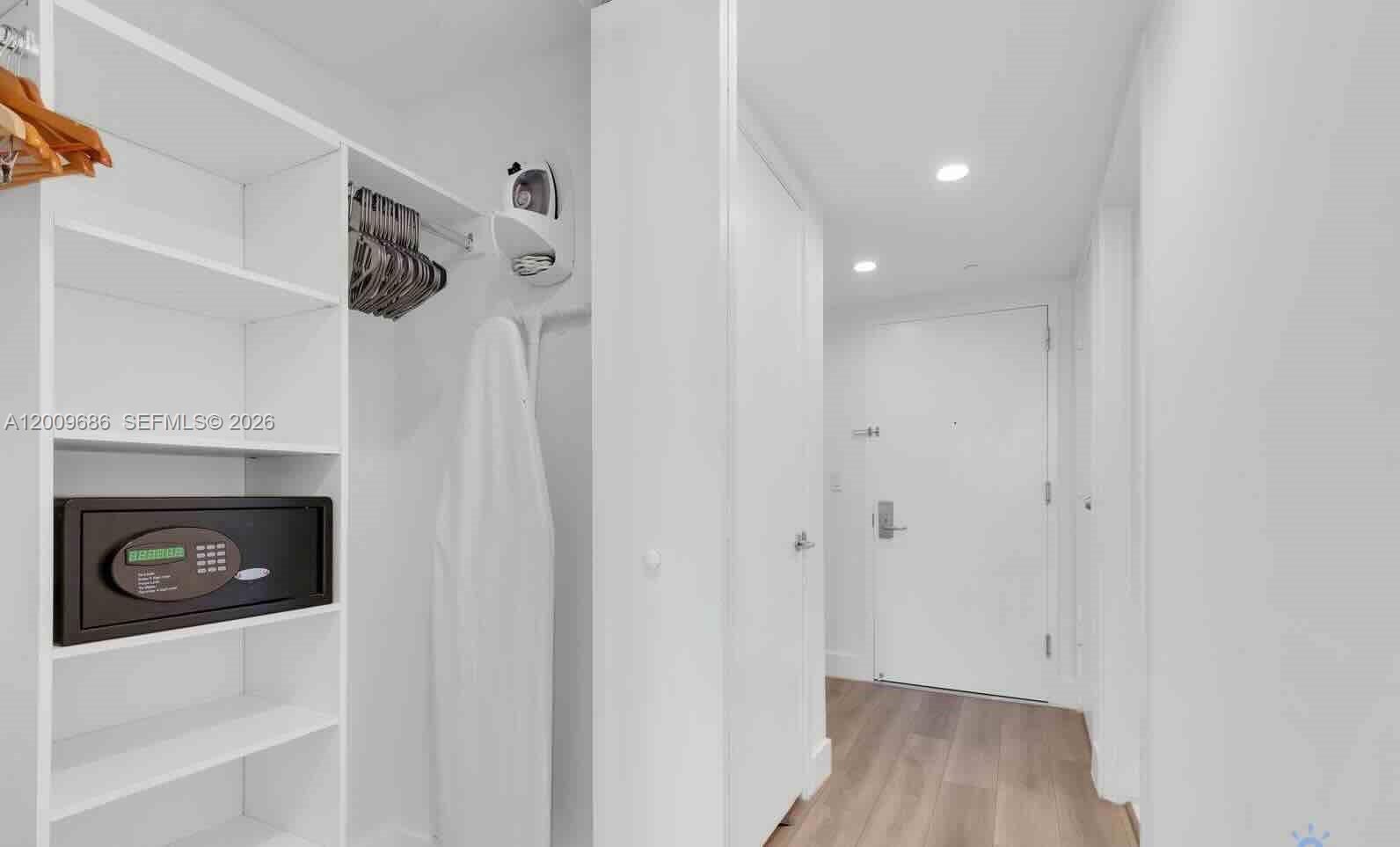 2602 East Hallandale Beach Boulevard, Unit R506 Hallandale Beach, FL 33009 - Photo 8 of 10 a room that has a fireplace