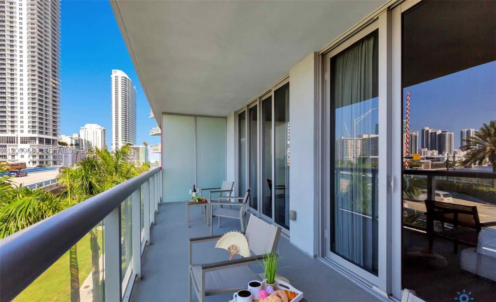2602 East Hallandale Beach Boulevard, Unit R506 Hallandale Beach, FL 33009 - Photo 9 of 10 a view of balcony and patio