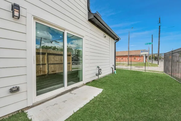 a view of backyard with tub