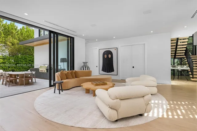 a outdoor dining space with furniture and a potted plant