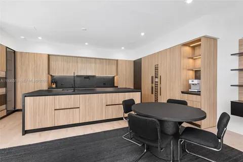 a bedroom with a bed and a table