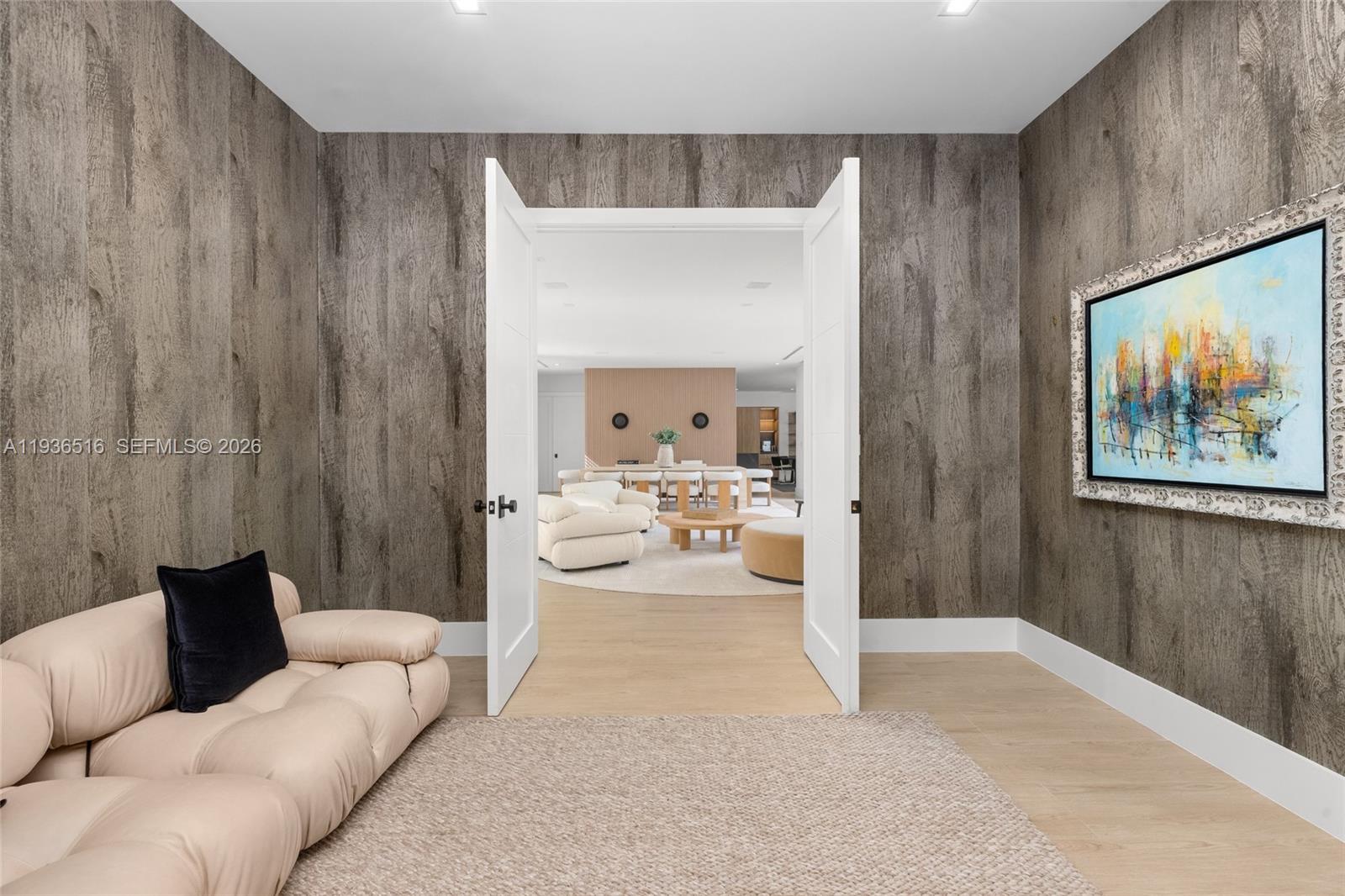 6003 Southwest 80th Street South Miami, FL 33143 - Photo 31 of 98 a living room with furniture and a large window